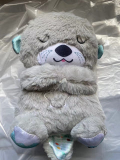 Peluche loutre Sound Machine Soothe 'n Snuggle avec lumières, sons et mouvements de respiration rythmiques pour bébé